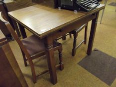 Oak dining table and two chairs