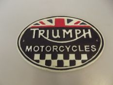 Cast iron Triumph sign