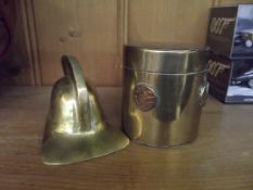 Brass fireman's helmet with a brass lidded caddie