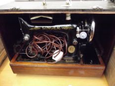Cased singer sewing machine