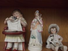 3 Bisque figures, largest a/f
