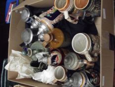 Large box of steins, decanters and others
