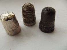 3 silver thimbles