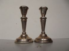Pair of Silver dwarf candle sticks