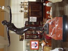 Art Deco bronze figure on a marble base. 48cm