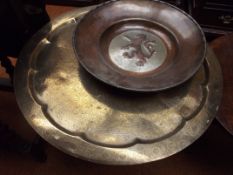 Brass top table with a copper charger