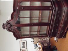 Bombe shaped display cabinet