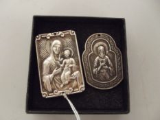 2x Religious plaques, possibly silver