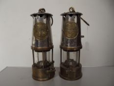Two Eccles miners lamps