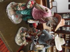 Two large Capodimonte style figures