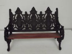 Very heavy cast metal miniature bench/bookshelf