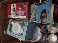 Box to include Vulcan hand sewing machine