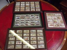 4 framed cigarette cards
