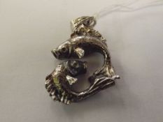 Fish pendant, possibly silver