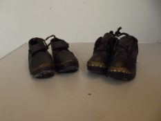 Two pairs of ceramic child's clogs