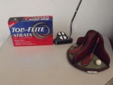 Golf putter, golf balls and pair of golfing booken