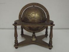 Brass zodiac globe