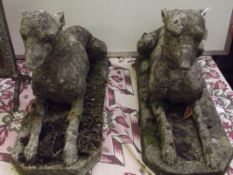 Pair of stoneware garden greyhounds