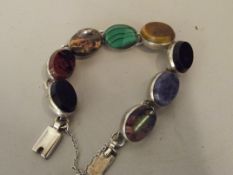 Silver bracelet with 8 hard stones