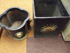 Two heavy cast iron planters