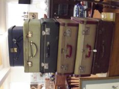 Stack of six vintage cases