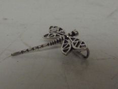Silver stamped dragonfly