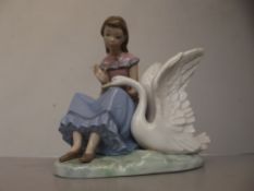 Nao figure of a girl and a swan