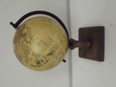 Globe on wooden stand