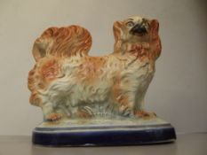 Staffordshire figure of a dog