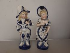 Pair of German ceramic figures, one a/f