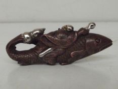 Bronze Oriental fish god