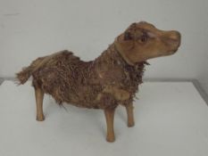 Wooden sheep figure