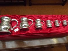Cased graduating set of petwer tankards