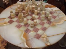 Onyx table with chess board and chess pieces