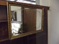 Large gilt frame bevelled mirror with etched decor