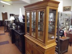 Good quality light wood display cabinet