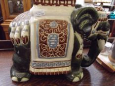 Ceramic plant stand in the form of an elephant