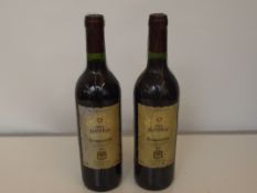 Two bottles of Tempranillo wine, sealed and unopen