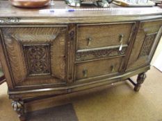 Oak sideboard on cup and cover supports
