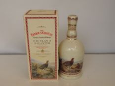 Bottle of Famous Grouse sealed and unopened 70cl d