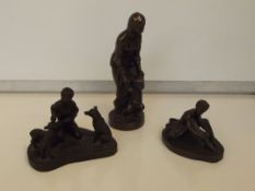 Three resin figures
