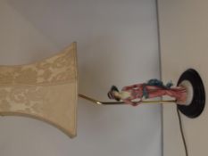 Resin table lamp in the form of a lady