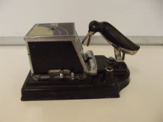Art Deco cigarette dispenser