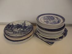 Large collection of blue and white plates