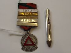 Silver safe diving medal together with silver hall