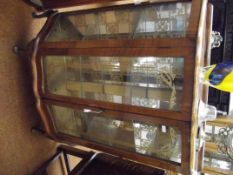 Walnut display cabinet with mirrored interior