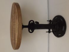 Wind up cast iron stool