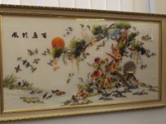 Large framed Oriental silk needle work