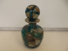 Mdina glass decanter with trade label, signed.