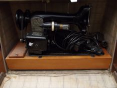 Cased sewing machine